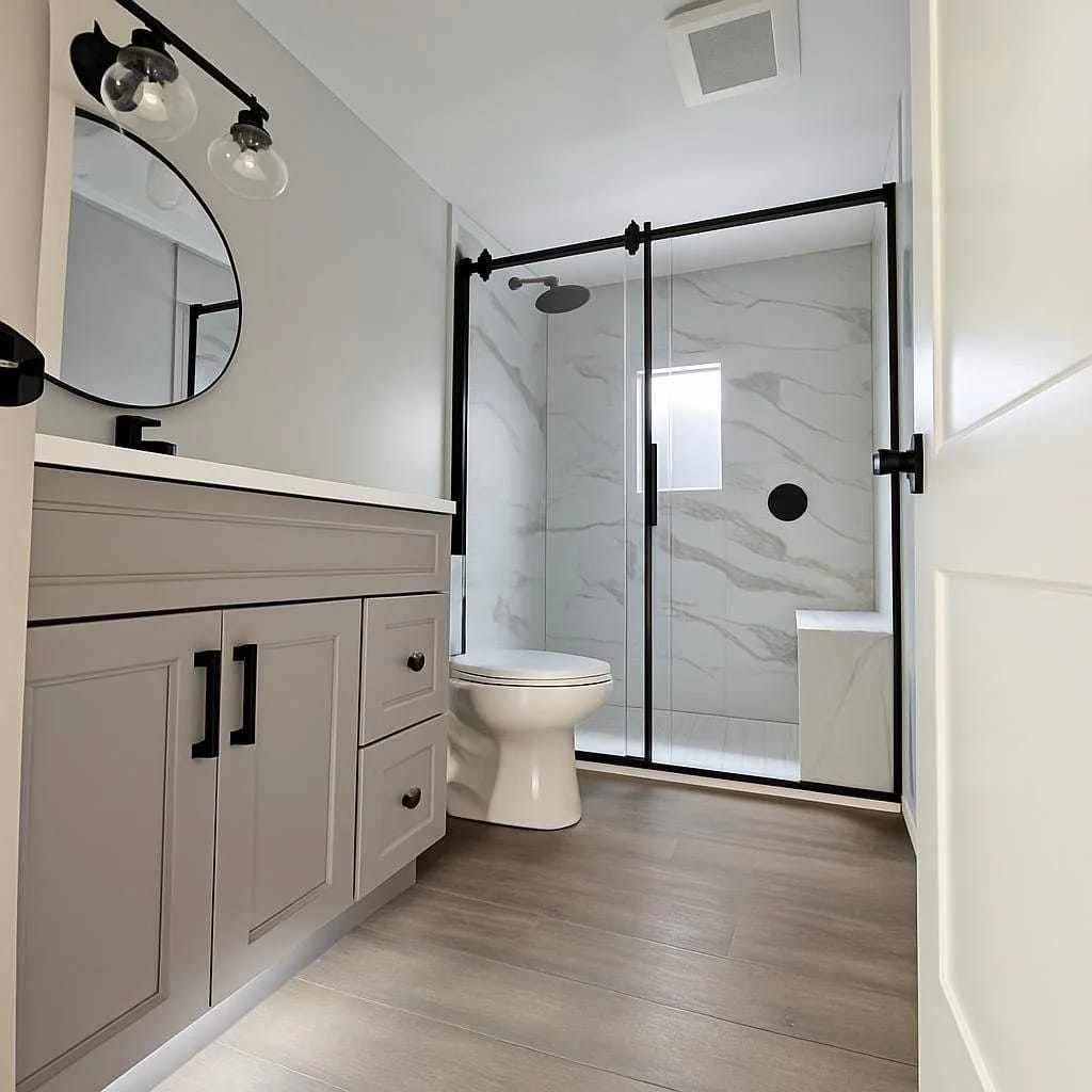 White-tiled bathroom with a glass shower enclosure and floating vanity